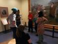 Stefan St-Laurent et des étudiant.es du cours de Jacques Arseneault dans l'exposition sur Évangéline du Musée Acadien